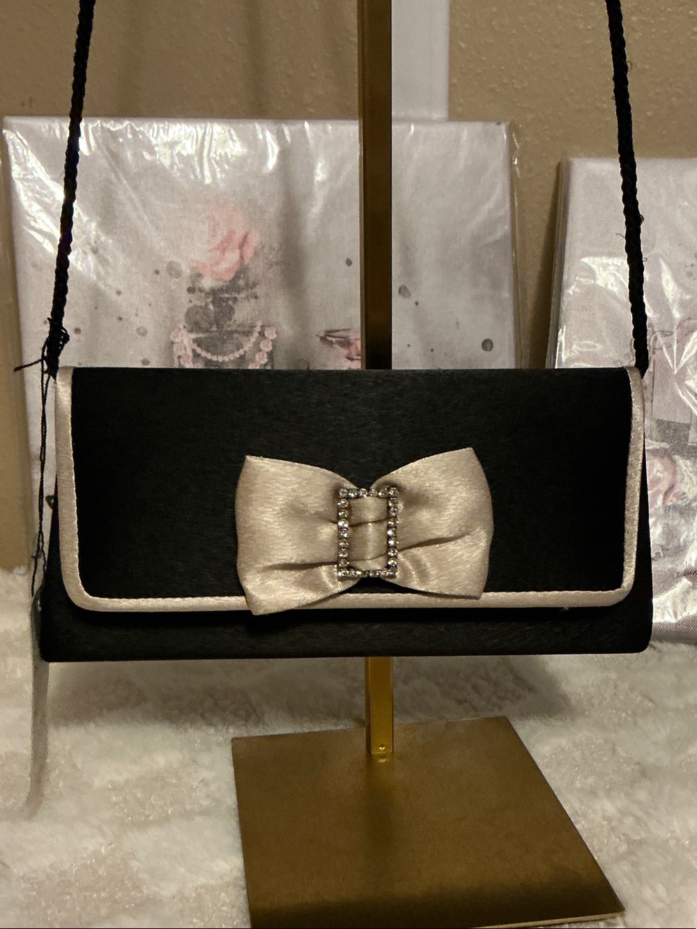 Black Evening Clutch with Champagne Bow Accent and Chain